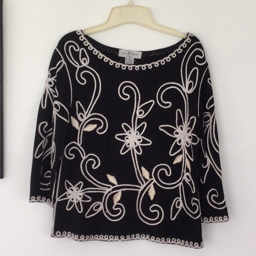 Woman’s Top by Once Agatha size petite L 65 % polyester color black& sliver #95